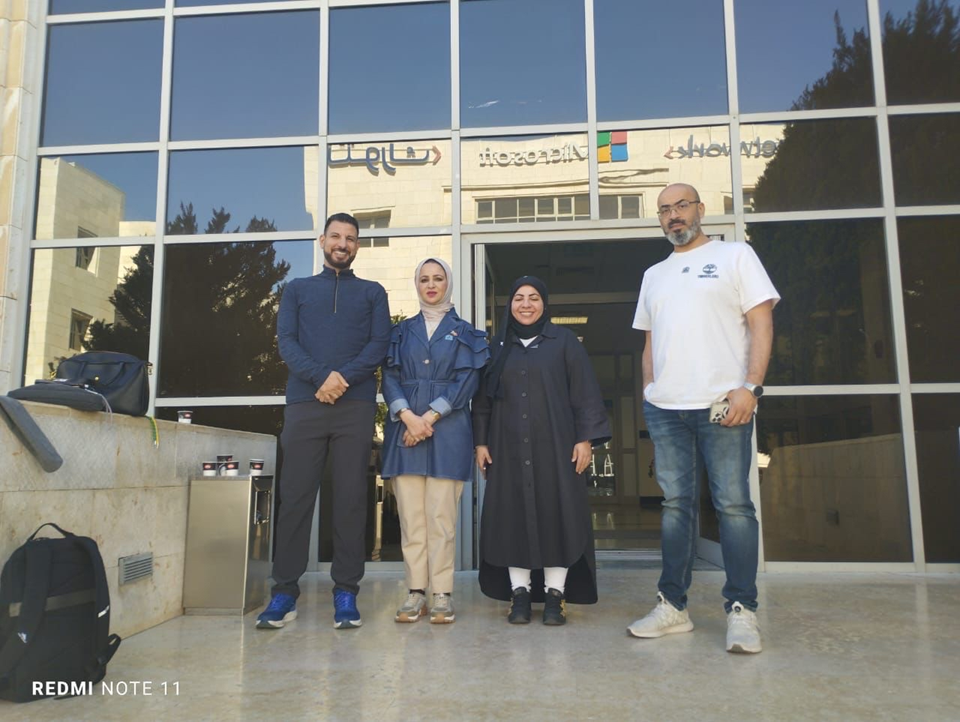 Group posing in front of the workshop location.
