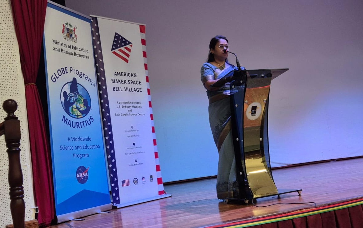 Person speaking on stage.